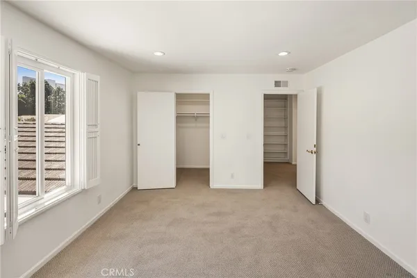 an empty room with a empty space and window