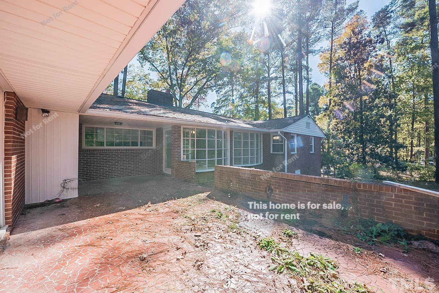 116 Ridge Road Butner, NC 27509 - Photo 14 of 16 a front view of a house with a yard