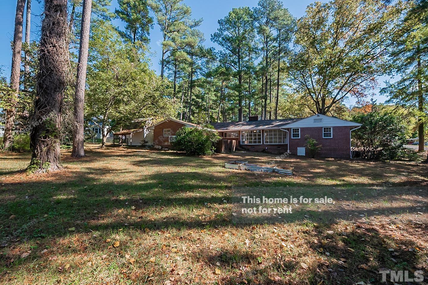 116 Ridge Road Butner, NC 27509 - Photo 15 of 16 a front view of a house with a garden