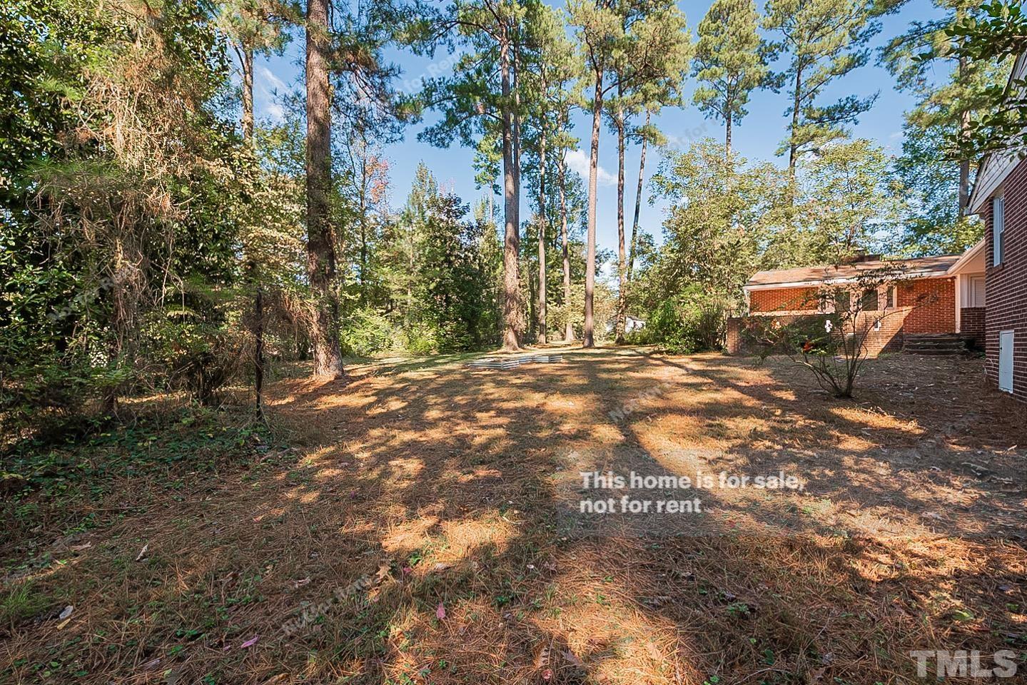 116 Ridge Road Butner, NC 27509 - Photo 16 of 16 a view of outdoor space with trees