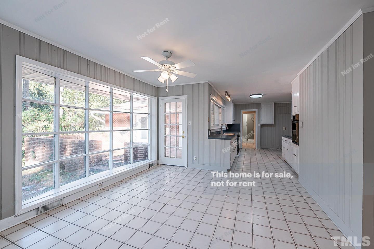 116 Ridge Road Butner, NC 27509 - Photo 7 of 16 a living room with furniture cabinets and a table