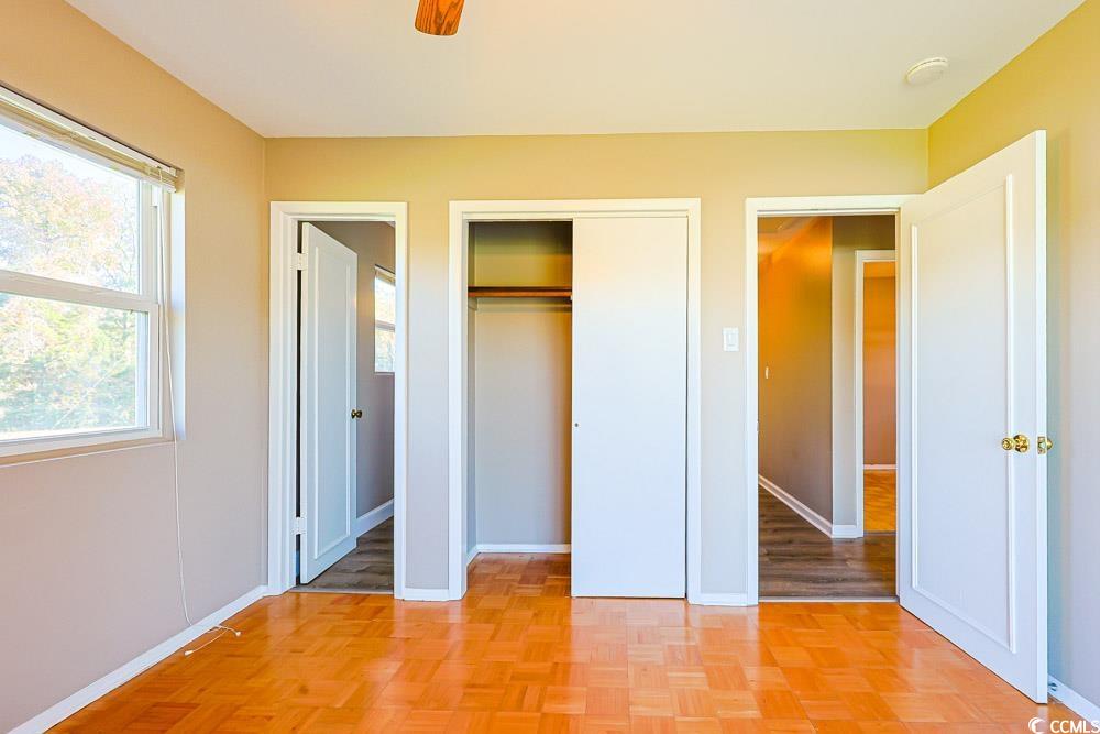 200 Math Place Little River, SC 29566 - Photo 14 of 40 Unfurnished bedroom with a closet and a ceiling fan