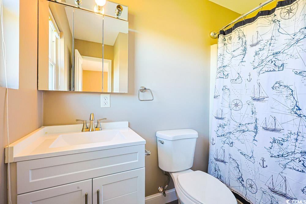 200 Math Place Little River, SC 29566 - Photo 15 of 40 Bathroom with vanity and curtained shower