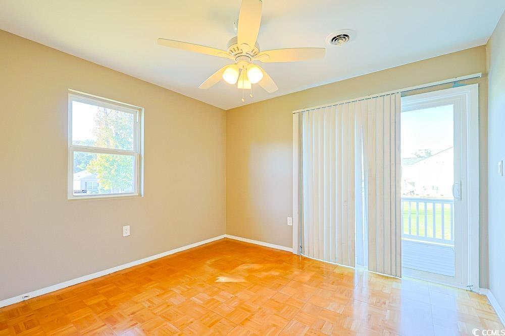 200 Math Place Little River, SC 29566 - Photo 17 of 40 Empty room featuring baseboards and a ceiling fan