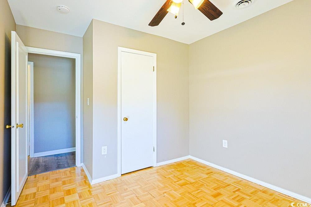 200 Math Place Little River, SC 29566 - Photo 22 of 40 Unfurnished bedroom featuring baseboards and a ceiling fan