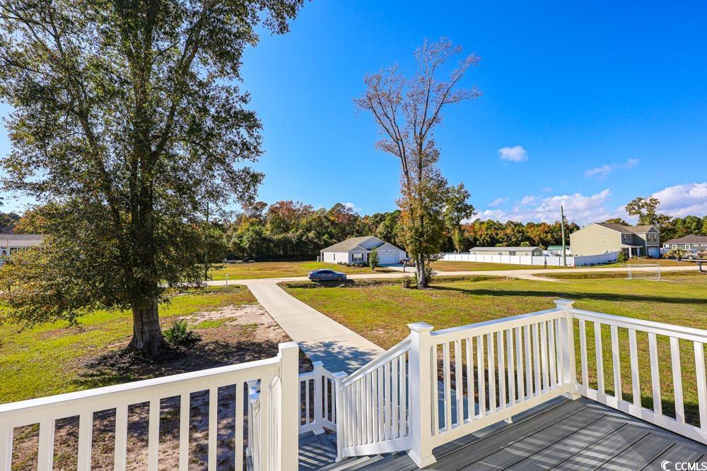 200 Math Place Little River, SC 29566 - Photo 28 of 40 Wooden terrace with a yard