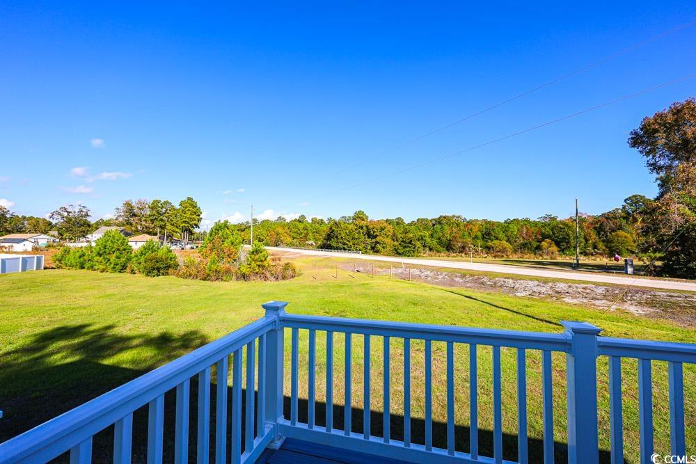 200 Math Place Little River, SC 29566 - Photo 36 of 40 View of grassy yard featuring a balcony