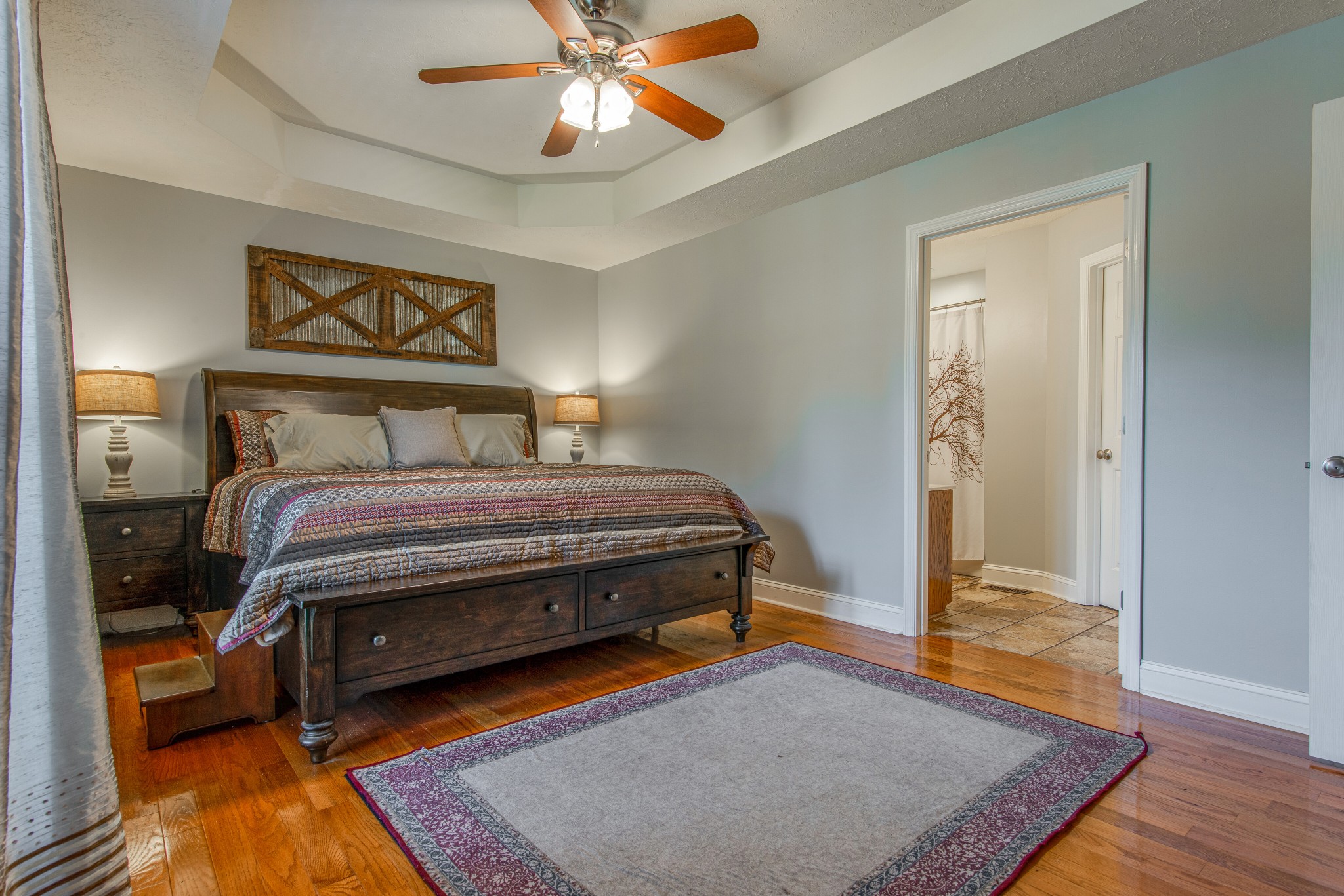 2696 Oak Grove Road Lebanon, TN 37090 - Photo 16 of 34 a bedroom with a bed and wooden floor
