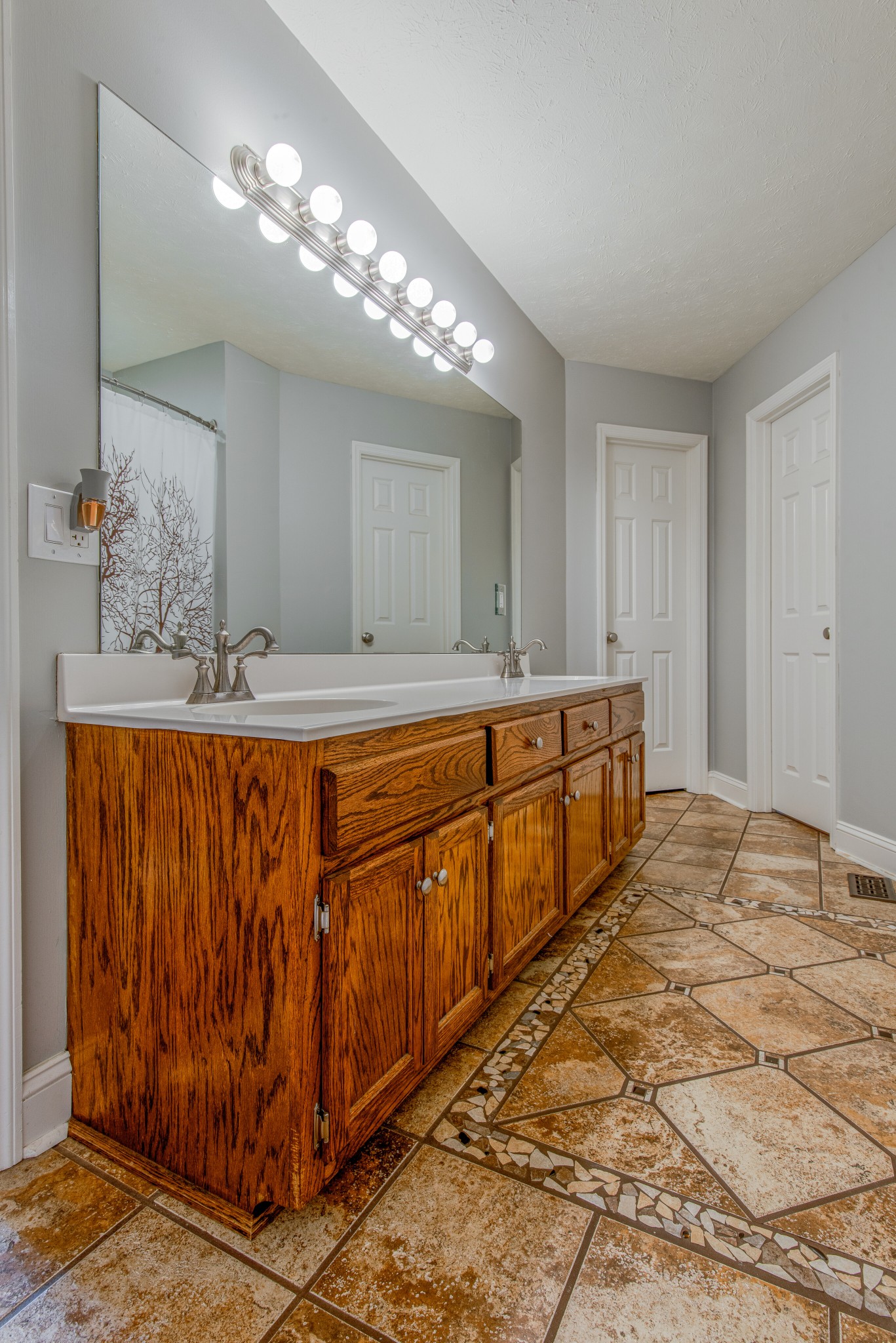 2696 Oak Grove Road Lebanon, TN 37090 - Photo 19 of 34 a room with a chandelier and kitchen view