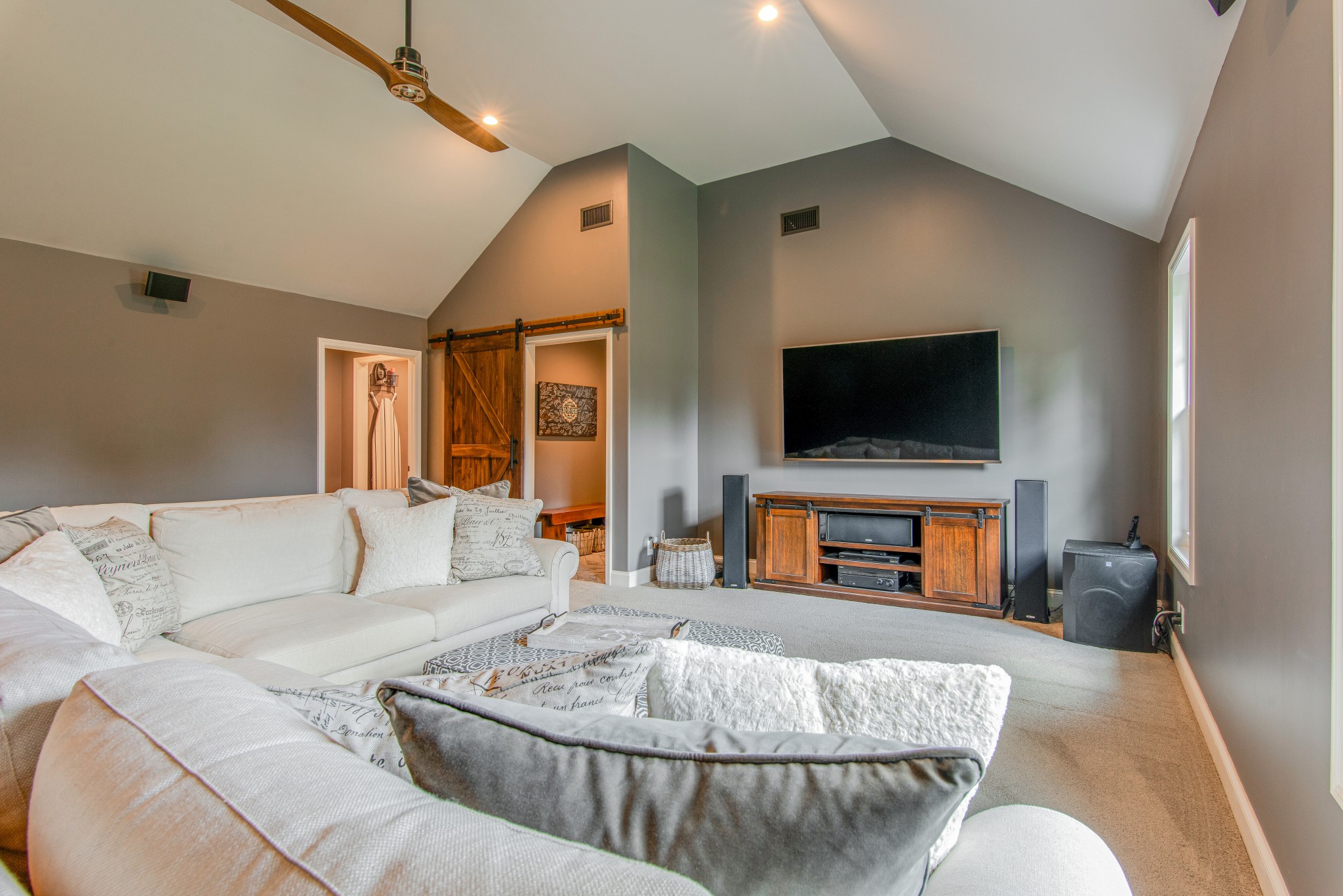2696 Oak Grove Road Lebanon, TN 37090 - Photo 27 of 34 a living room with furniture and a flat screen tv