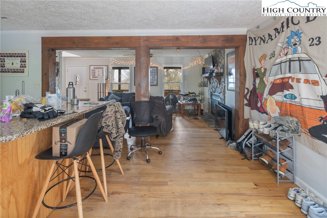 656 Winterberry Trail Boone, NC 28607 - Photo 15 of 47 a view of a dining room with furniture and chandelier