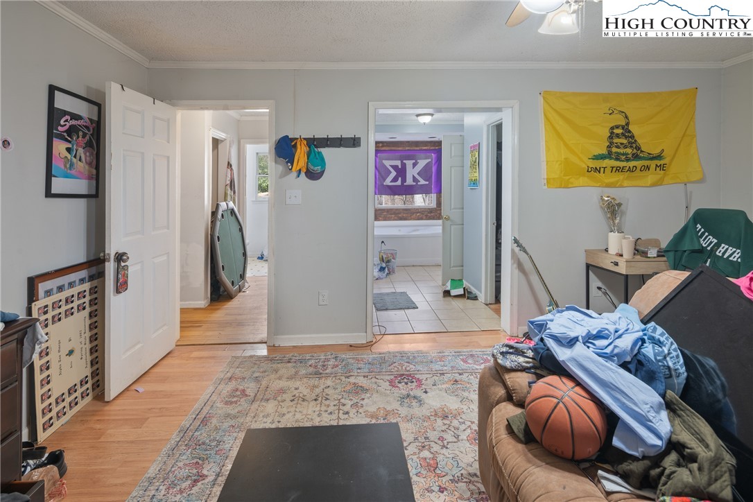 656 Winterberry Trail Boone, NC 28607 - Photo 20 of 47 a living room with furniture and a rug
