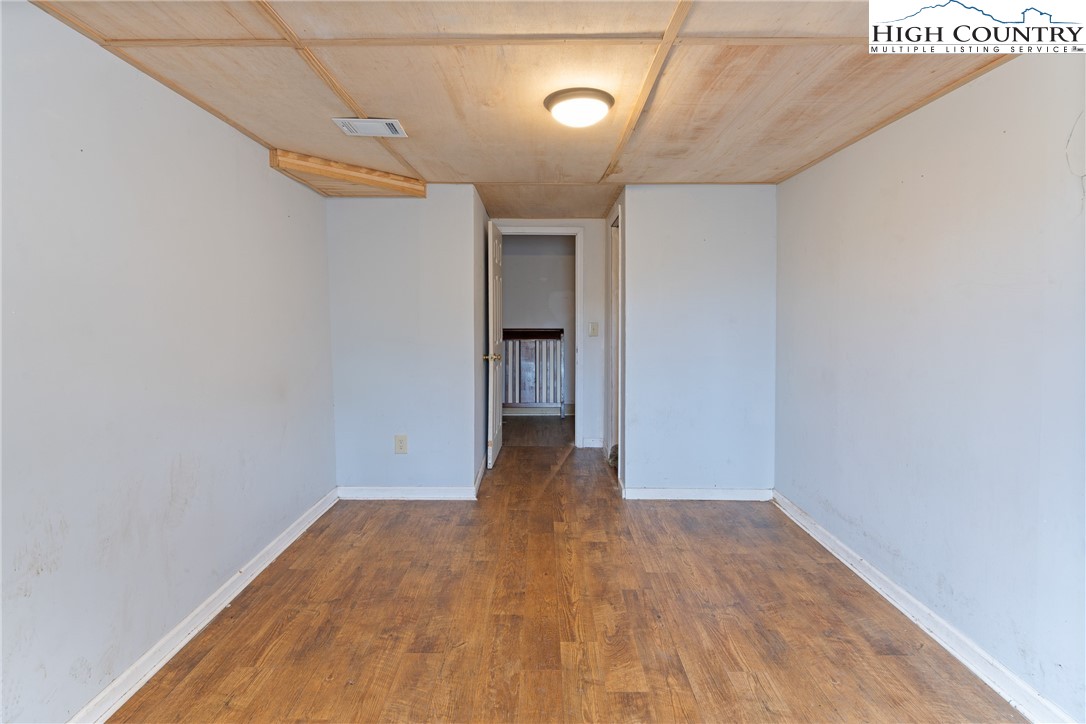 656 Winterberry Trail Boone, NC 28607 - Photo 32 of 47 a view of hallway with wooden floor