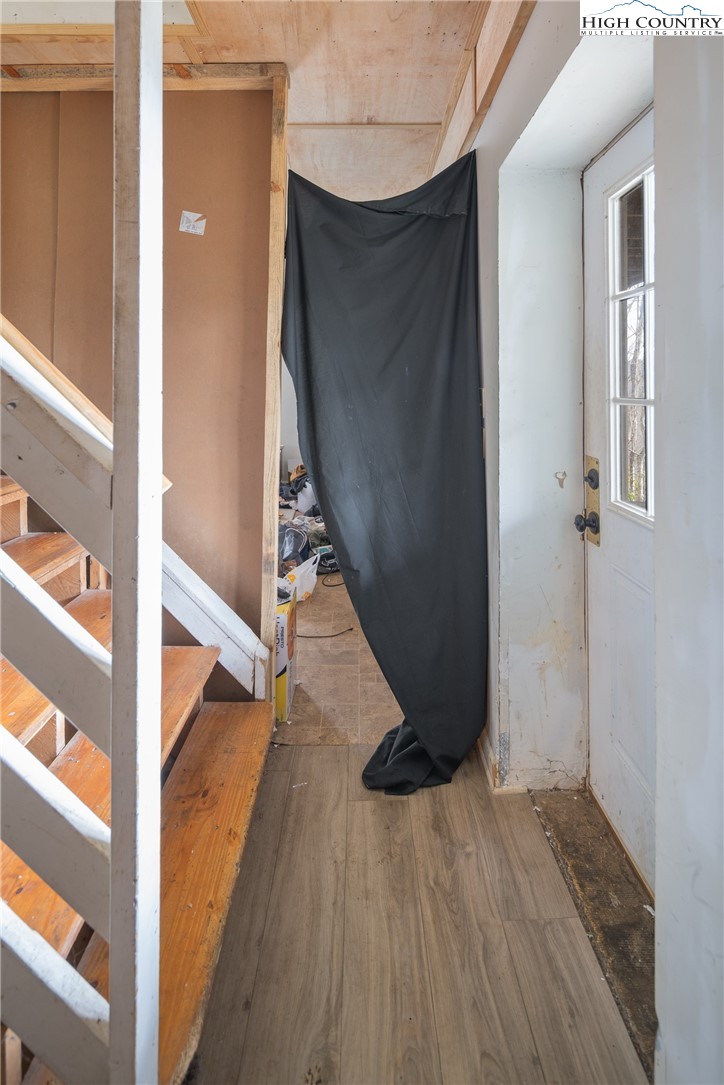 656 Winterberry Trail Boone, NC 28607 - Photo 35 of 47 a view of entryway with wooden floor