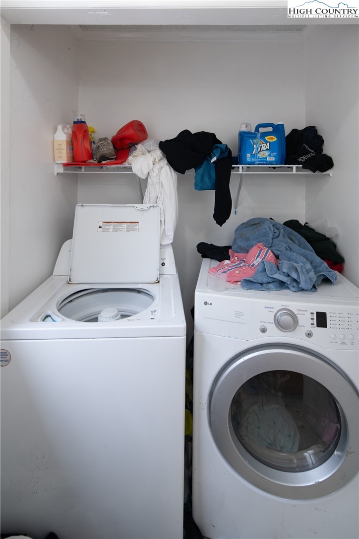656 Winterberry Trail Boone, NC 28607 - Photo 40 of 47 a utility room with dryer and washer
