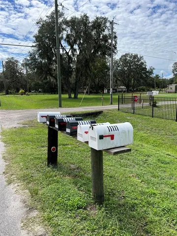 a view of a park with swings