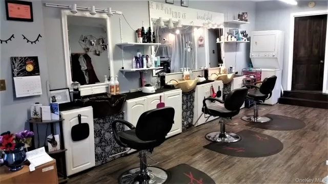 a view of a workspace with furniture and toys