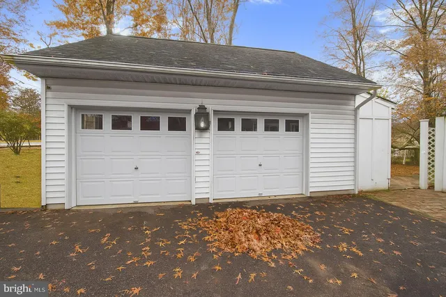 a view of empty room with wooden walls