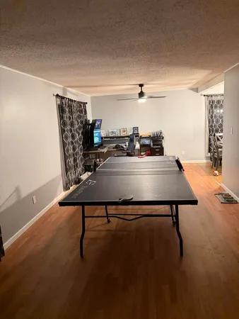 a view of a workspace with furniture