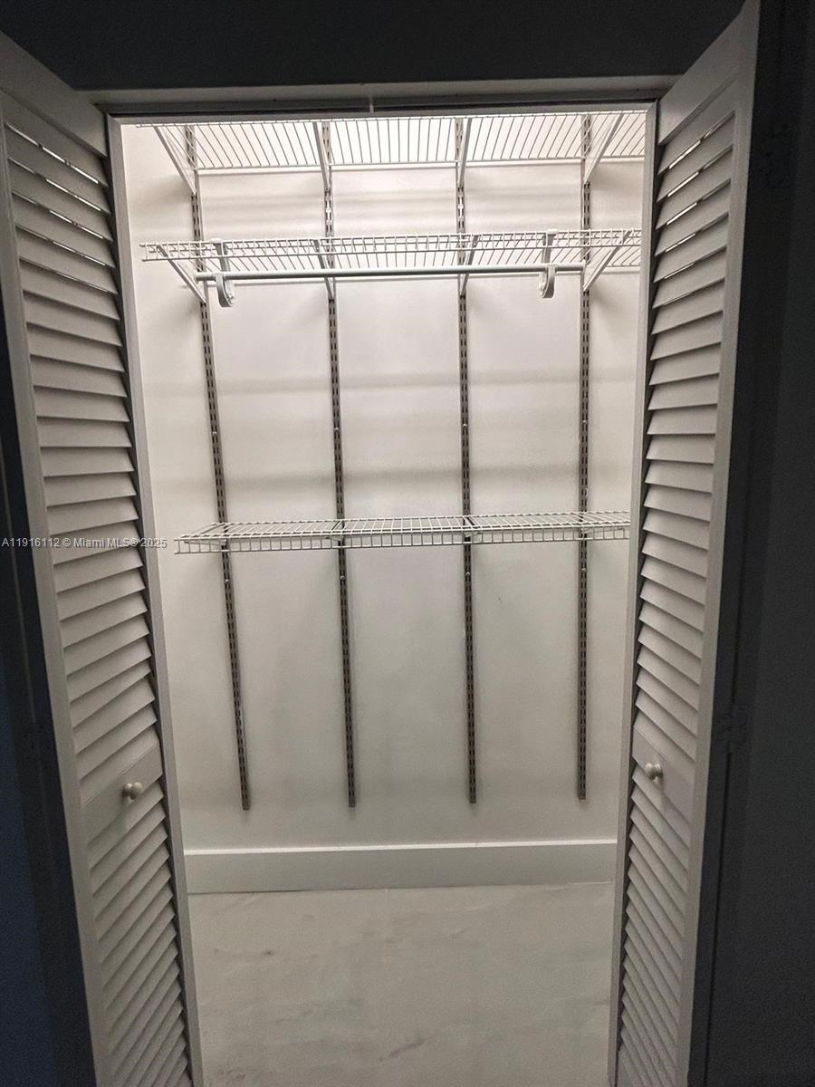 1750 Northeast 191st Street, Unit 4264 Miami, FL 33179 - Photo 21 of 21 a bathroom with a shower