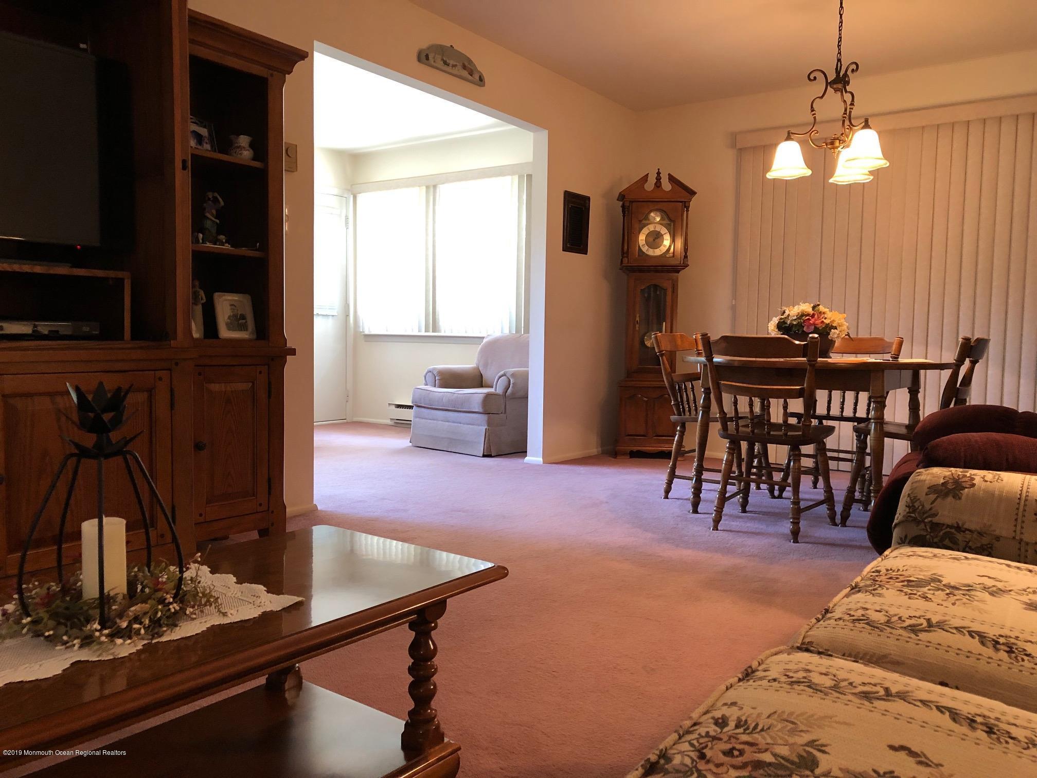 15 Robinson Road Brick, NJ 08724 - Photo 12 of 24 a view of a livingroom with furniture and window