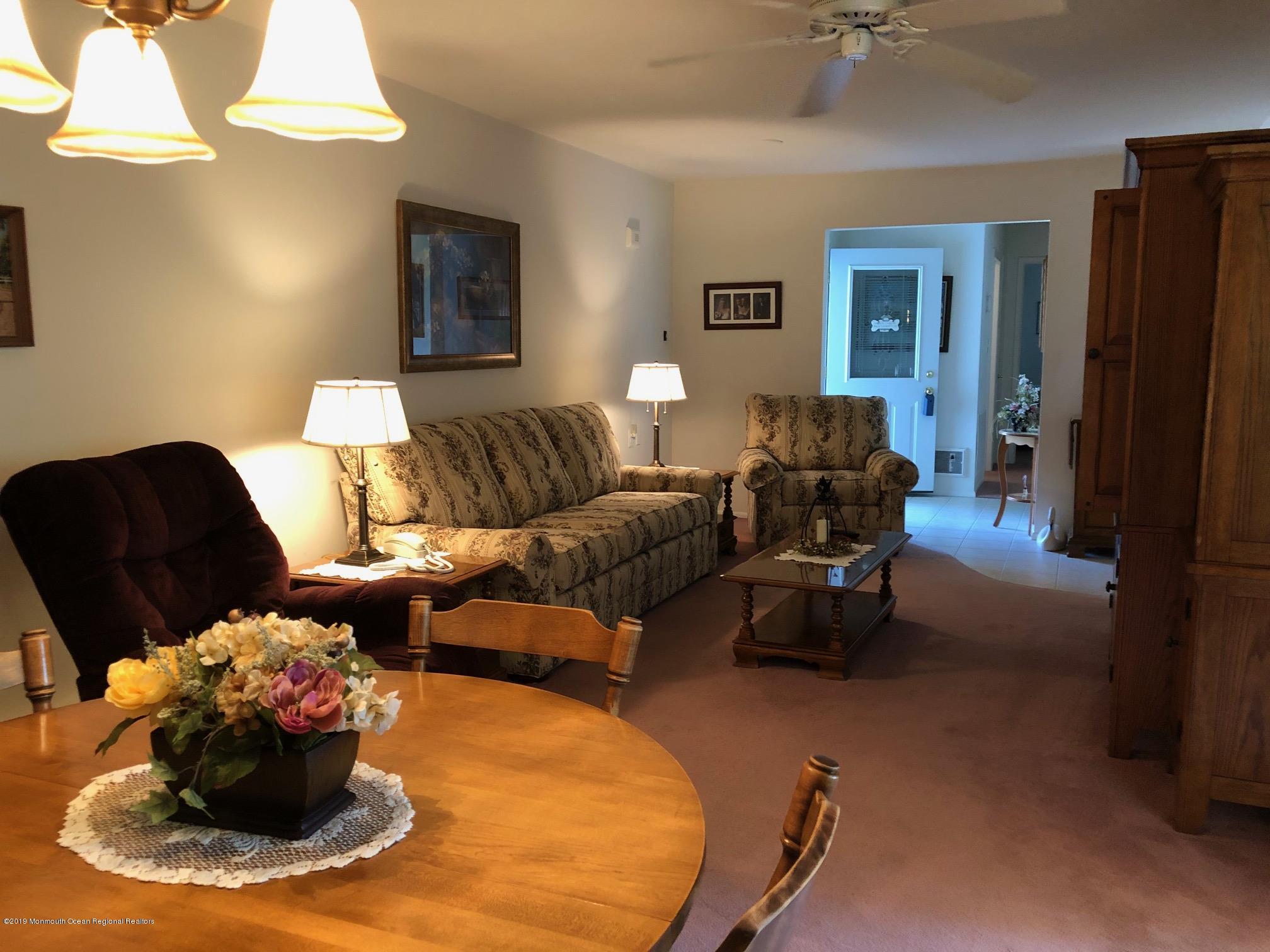 15 Robinson Road Brick, NJ 08724 - Photo 20 of 24 a living room with furniture and a couch