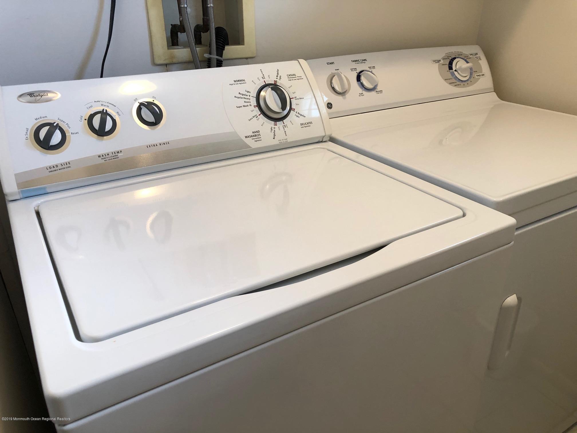15 Robinson Road Brick, NJ 08724 - Photo 22 of 24 a utility room with dryer and washer