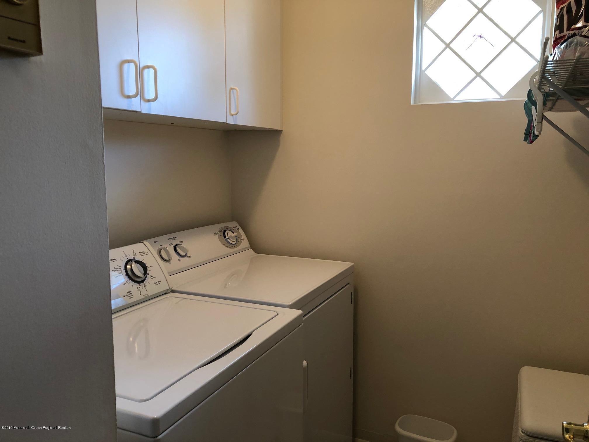 15 Robinson Road Brick, NJ 08724 - Photo 23 of 24 a utility room with dryer and washer