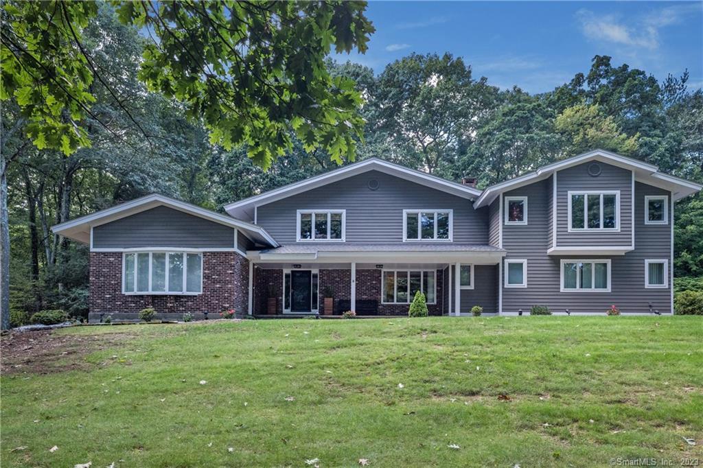 89 Daventry Hill Road Avon, CT 06001 - Photo 1 of 1 a front view of a house with a garden
