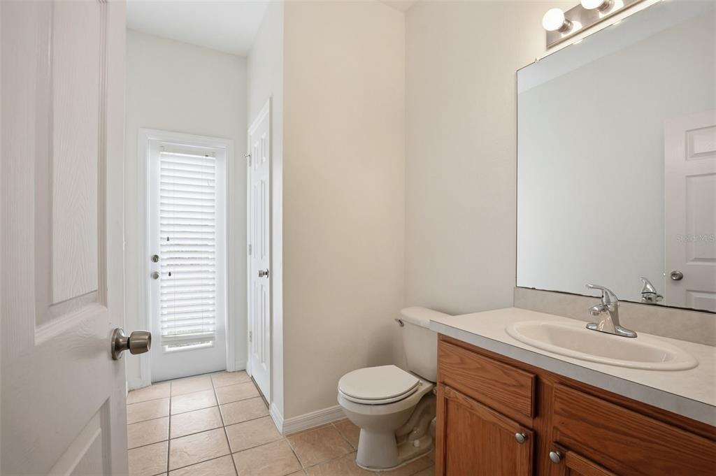 7702 Dragon Fly Loop Gibsonton, FL 33534 - Photo 35 of 42 a bathroom with a sink toilet and shower