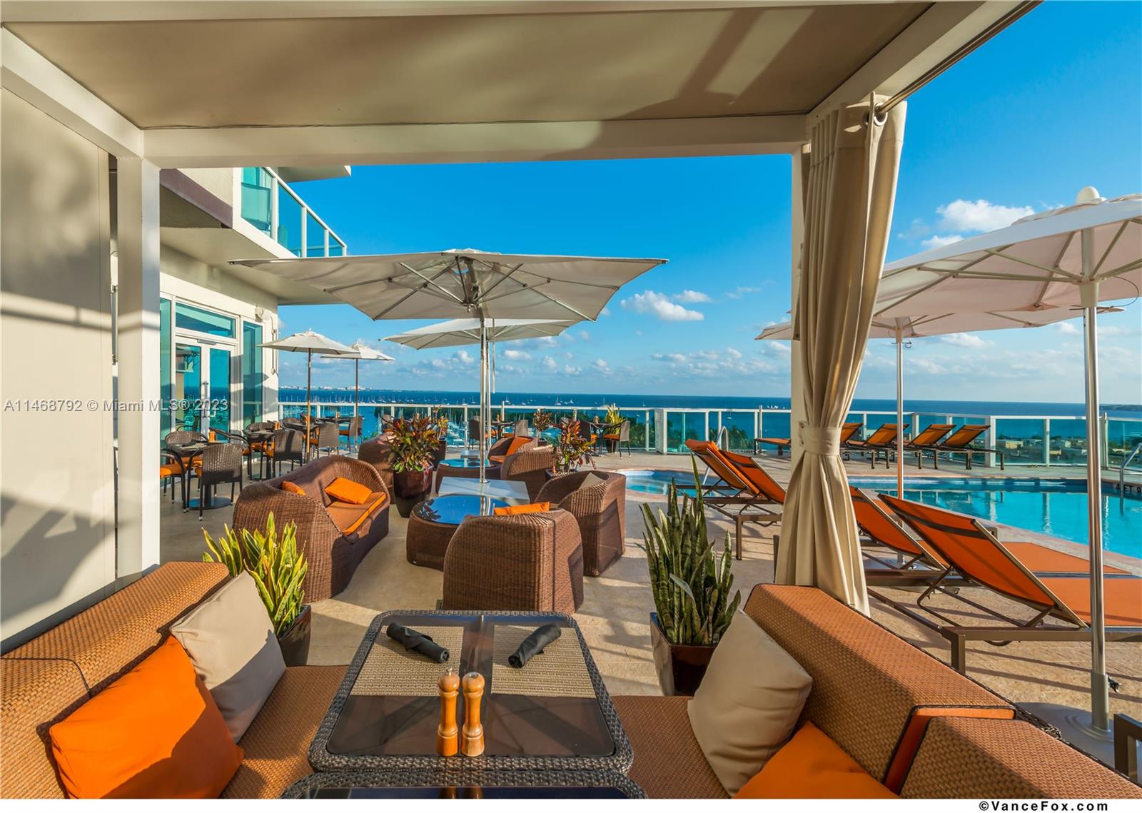 2889 McFarlane Road, Unit 903 Miami, FL 33133 - Photo 6 of 10 an outdoor space with seating
