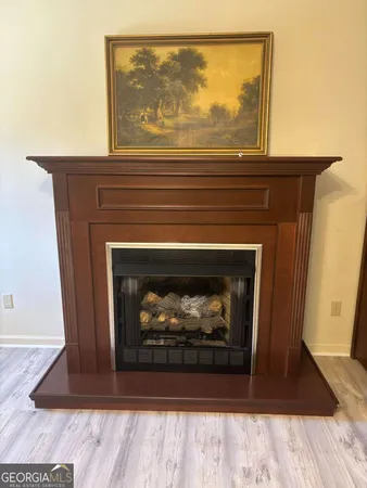 a living room with a fireplace