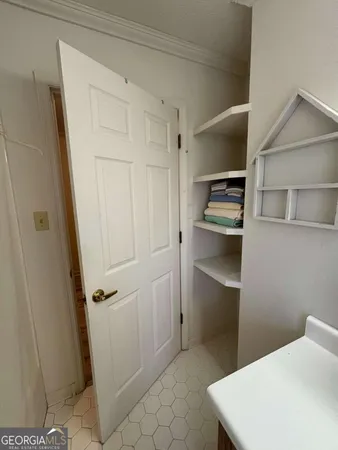 a view of a lake with a yard