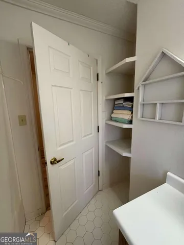 a view of a lake with a yard