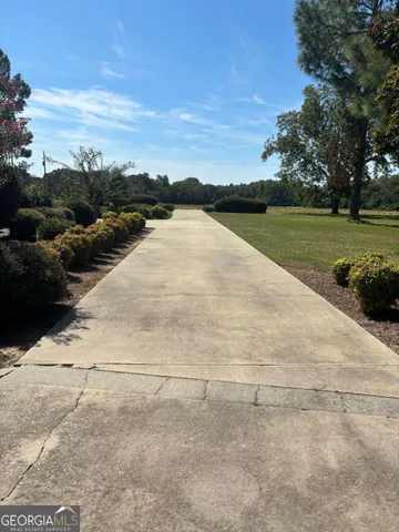 a view of hallway with wooden floor