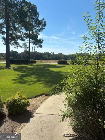 a view of entryway with a front door