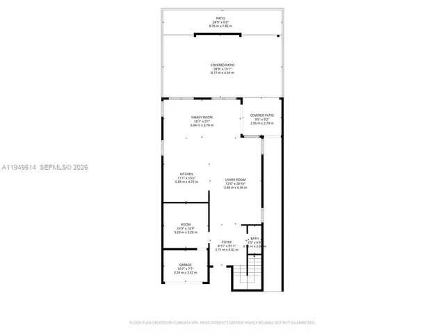 a picture of a bench in front of a gate