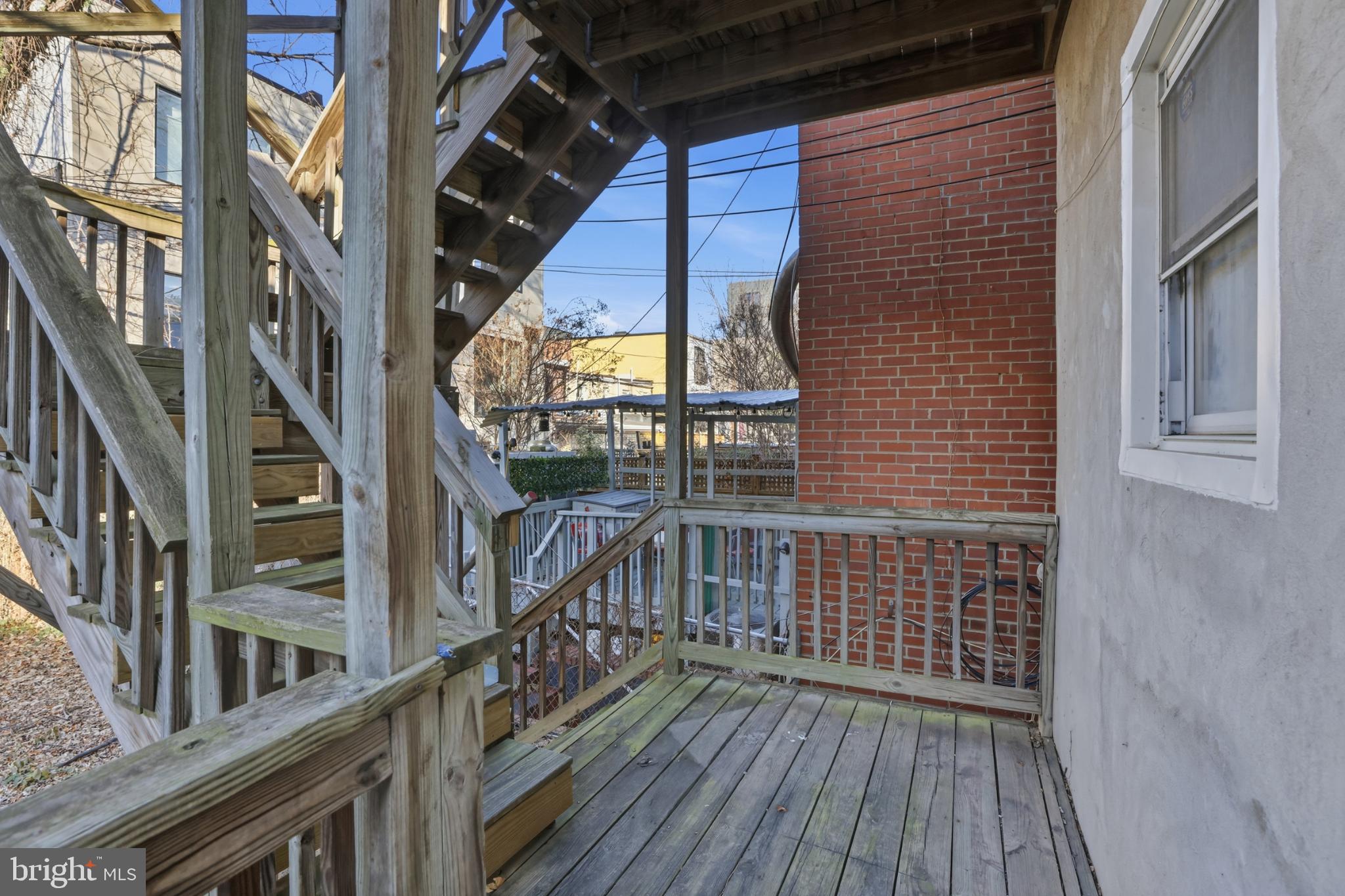 1912 9th Street Northwest, Unit 1 Washington, DC 20001 - Photo 16 of 18 Charming outdoor space with wooden stairs.