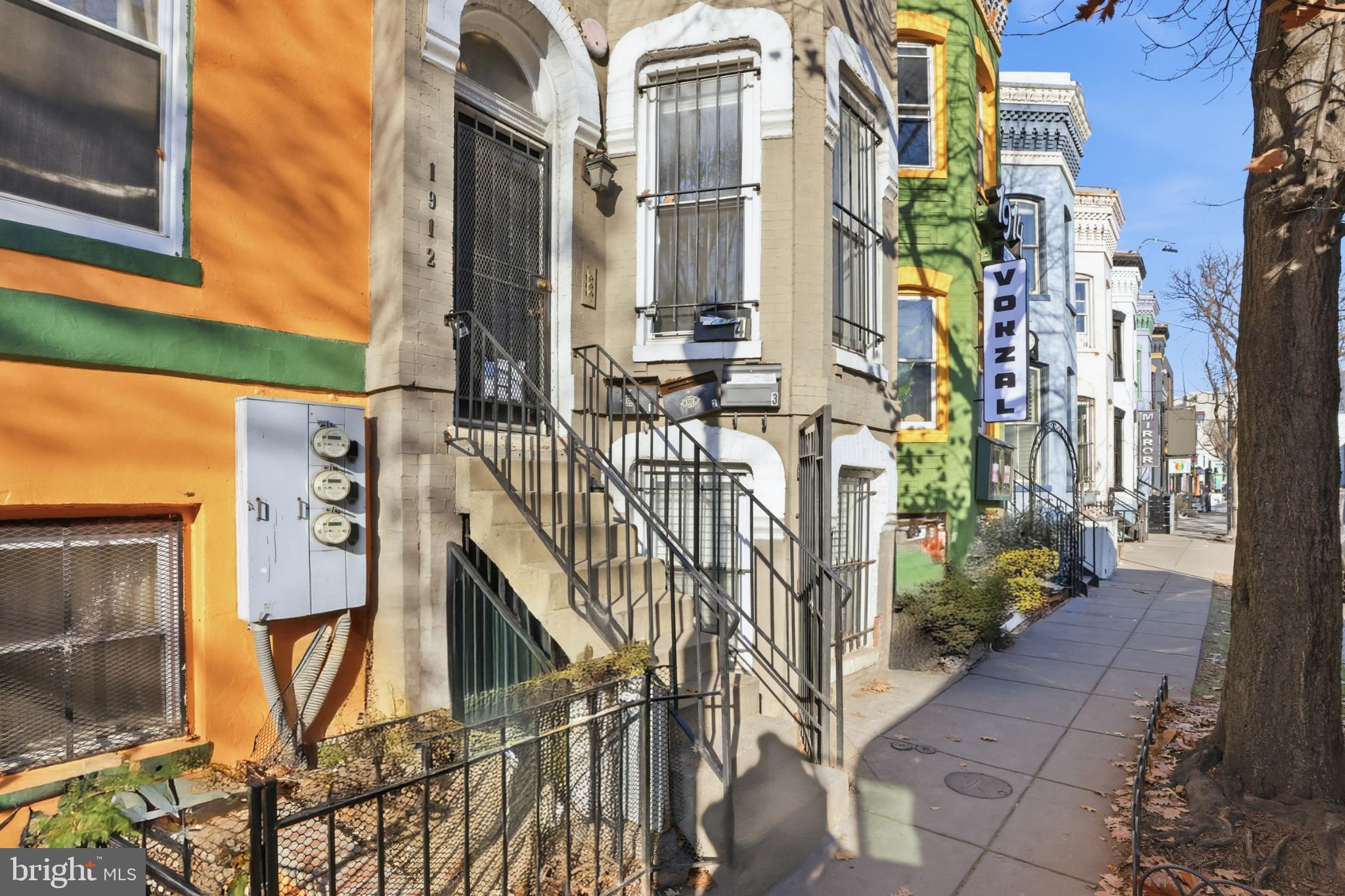 1912 9th Street Northwest, Unit 1 Washington, DC 20001 - Photo 2 of 18 Charming urban rowhouses with vibrant colors.
