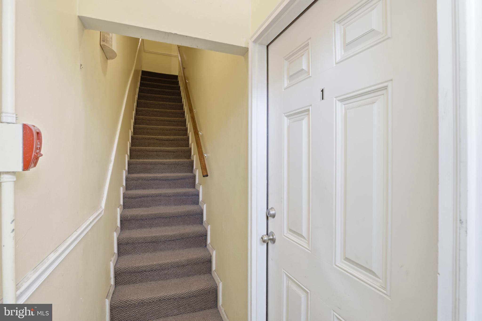 1912 9th Street Northwest, Unit 1 Washington, DC 20001 - Photo 4 of 18 Inviting entrance with staircase to explore.