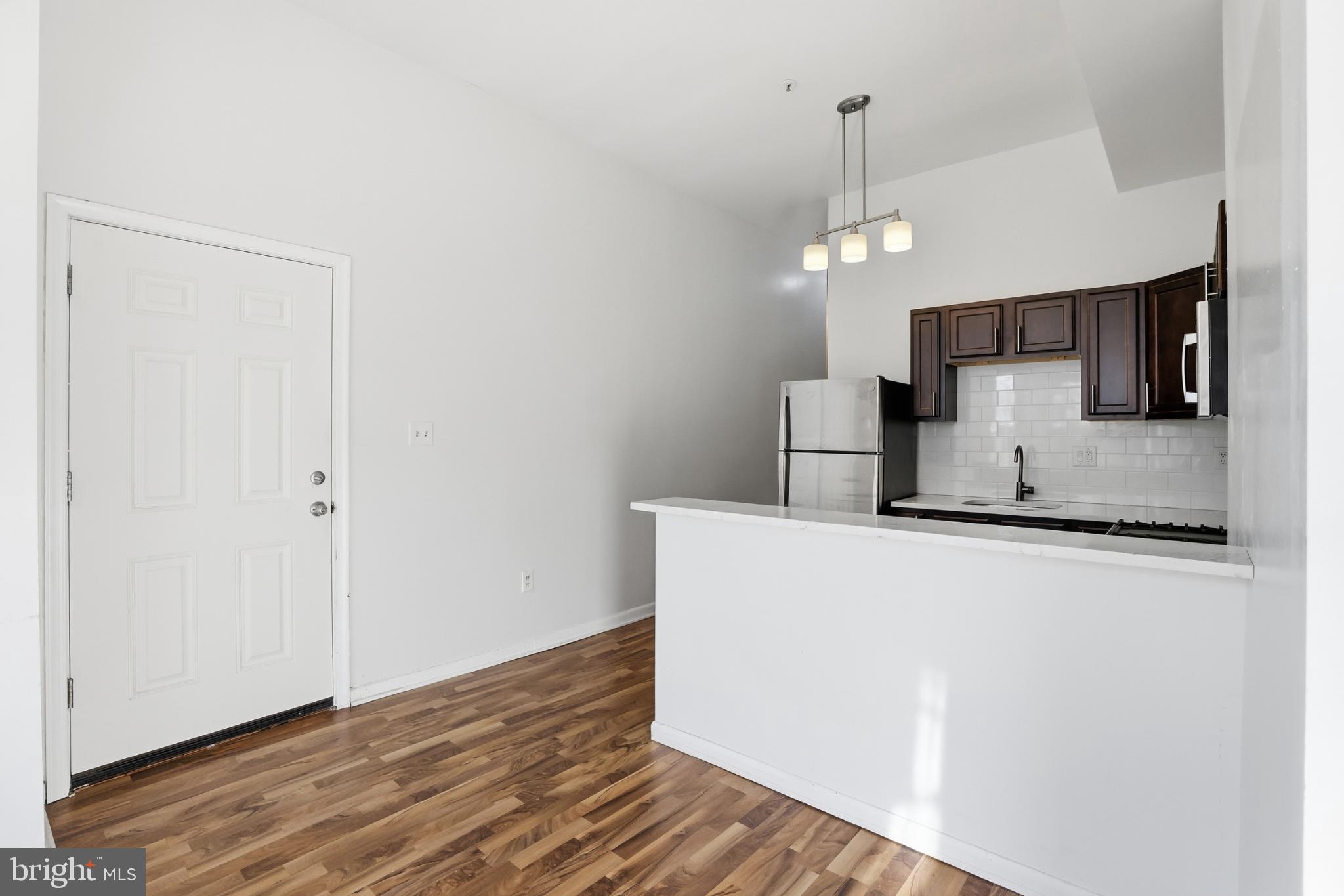 1912 9th Street Northwest, Unit 1 Washington, DC 20001 - Photo 7 of 18 Modern kitchen with sleek finishes.