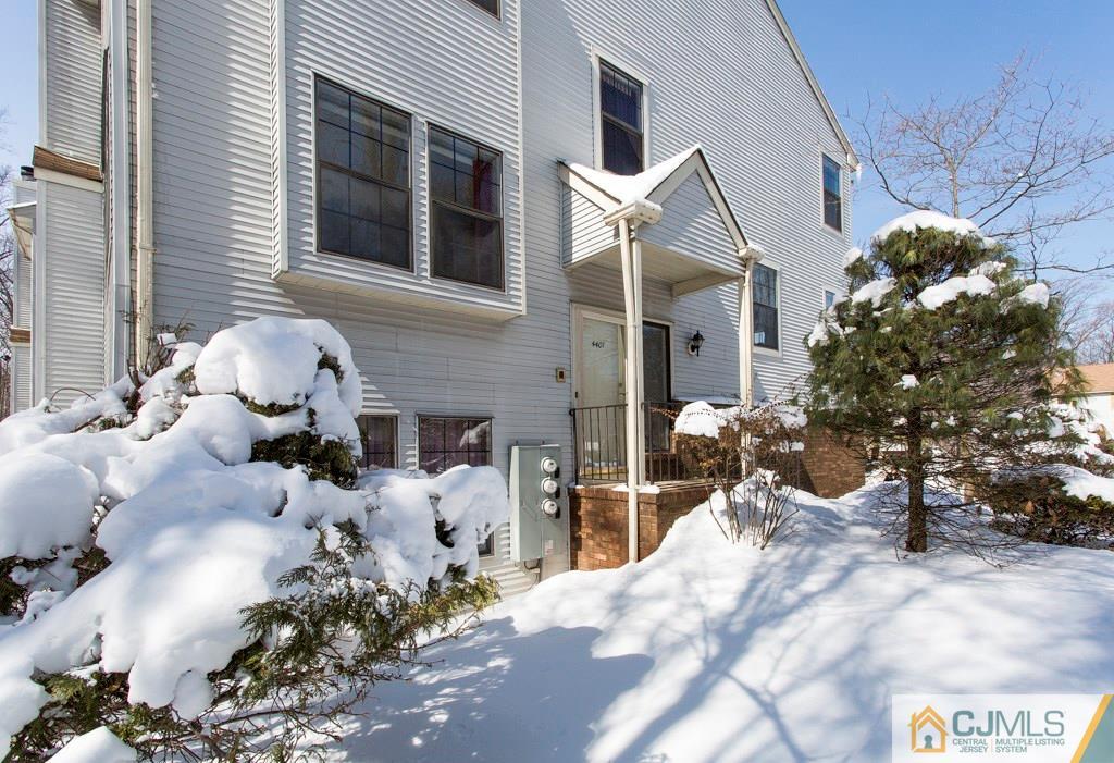 4401 Stonehedge Road, Unit 44 Edison, NJ 08820 - Photo 2 of 24 a view of a house with a yard and sitting area