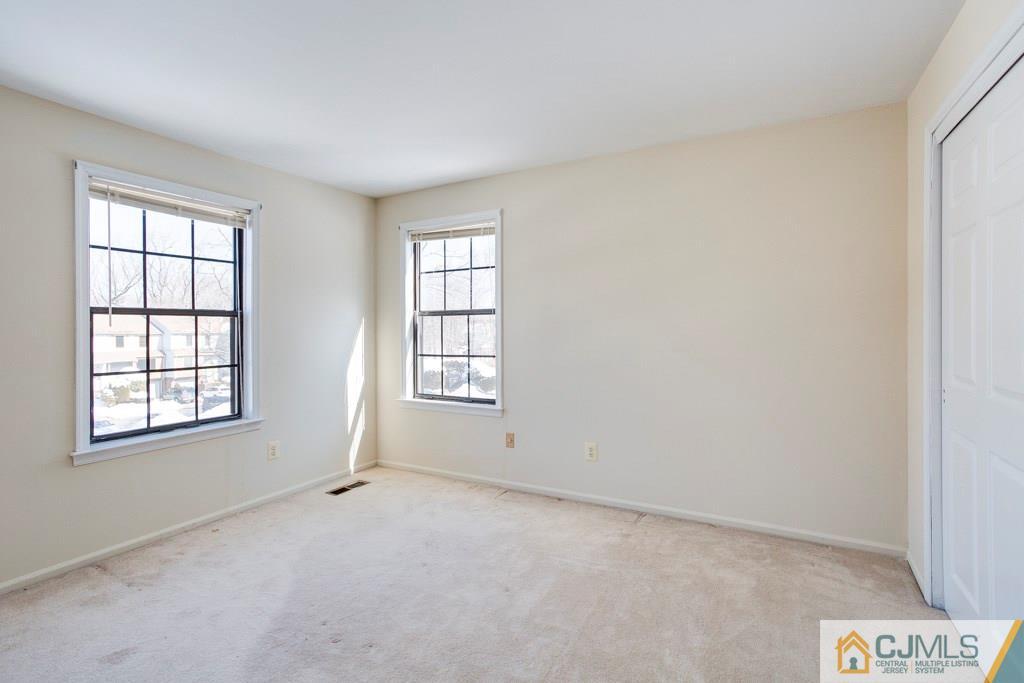 4401 Stonehedge Road, Unit 44 Edison, NJ 08820 - Photo 16 of 24 an empty room with windows