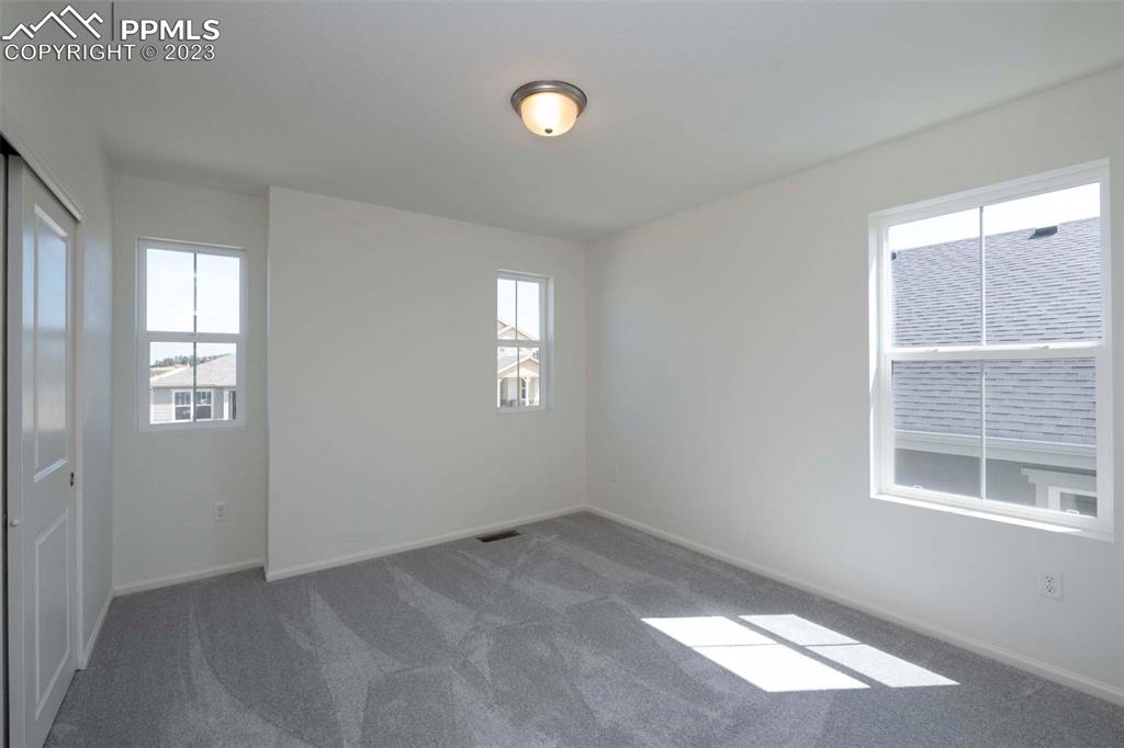 2050 Peachleaf Loop Castle Rock, CO 80108 - Photo 16 of 25 a view of a room that has a window in it