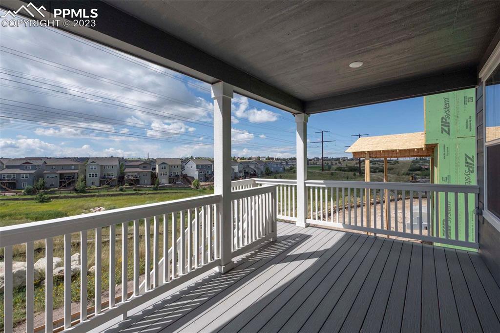 2050 Peachleaf Loop Castle Rock, CO 80108 - Photo 24 of 25 a view of a balcony with wooden floor