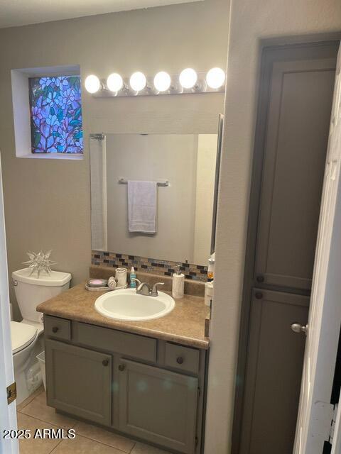 3848 North 3rd Avenue, Unit 1033 Phoenix, AZ 85013 - Photo 19 of 24 a bathroom with a sink and a mirror