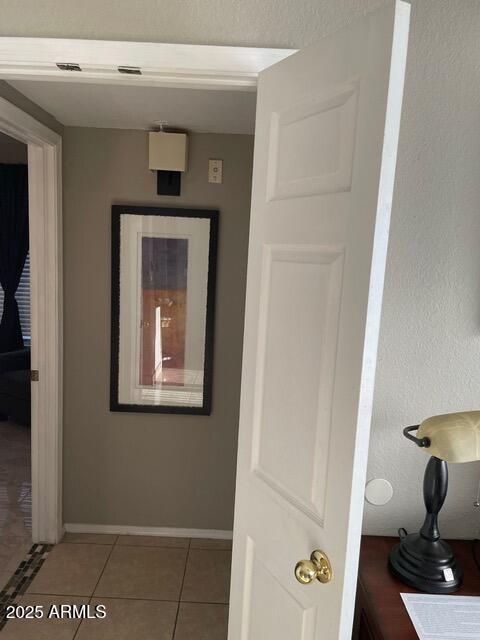 3848 North 3rd Avenue, Unit 1033 Phoenix, AZ 85013 - Photo 7 of 24 a view of a hallway to a house