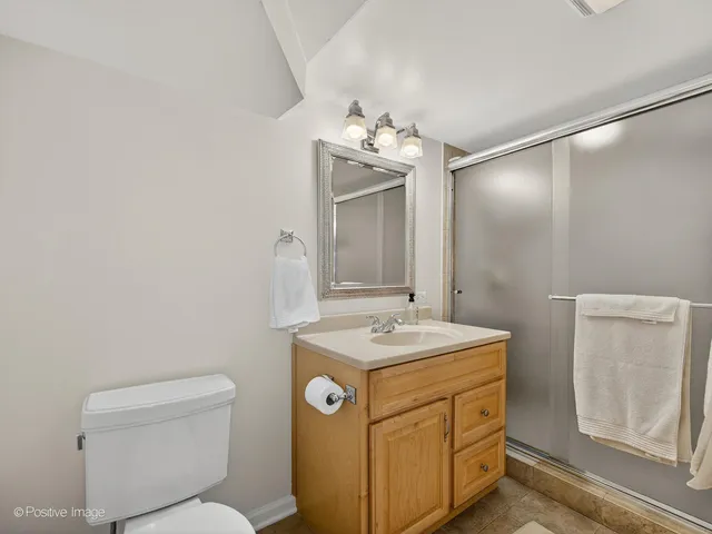 a view of an entryway with wooden floor and windows