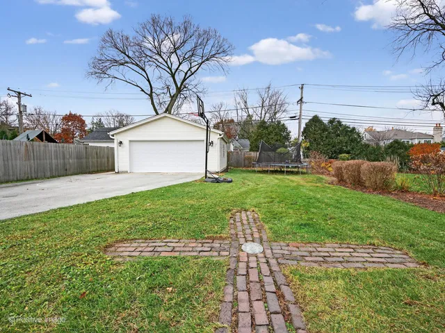 a view of multiple houses with a yard