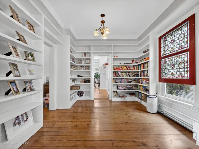 a view of an empty room with shelves